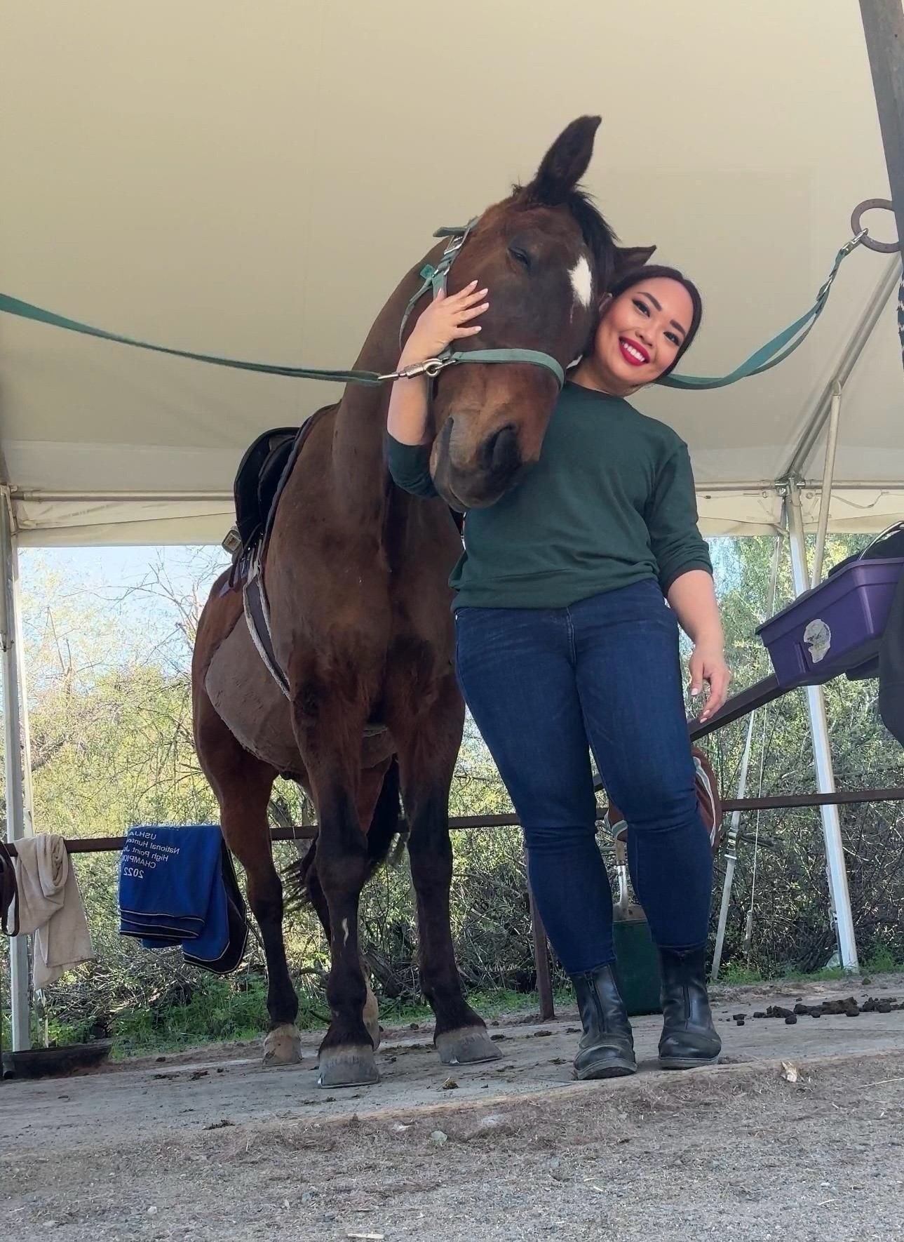 Pav Lertjitbanjong with Diego the horse — equestrian-based exposure training